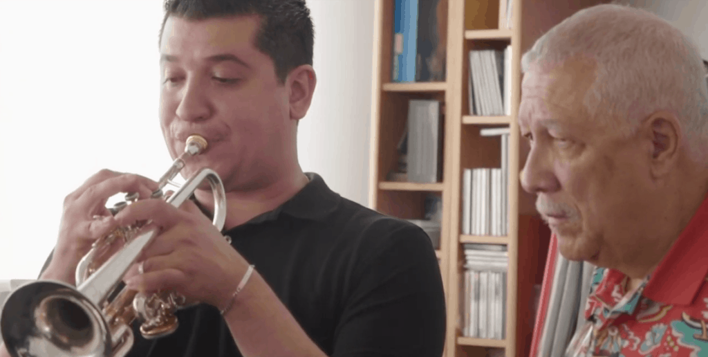 Paquito with Pacho Flores reviewing Trumpet Concerto
