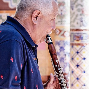 Paquito D'Rivera playing clarinet photo by Ricardo Rios