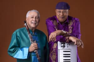 Paquito D'Rivera and Chucho Valdez photo with bronze background