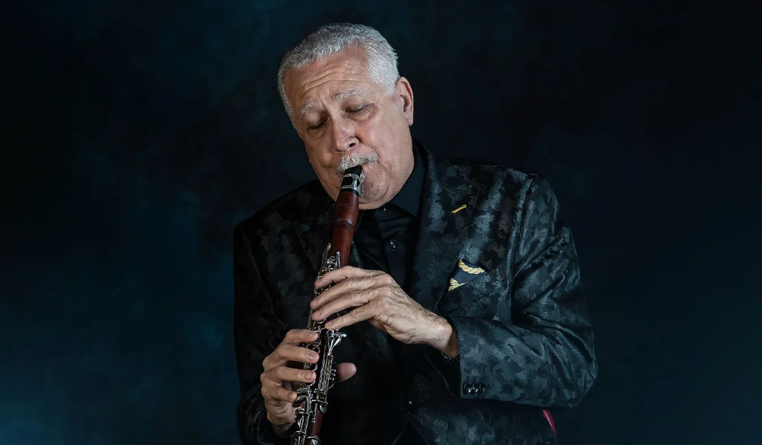 Paquito D'Rivera playing with black jacket